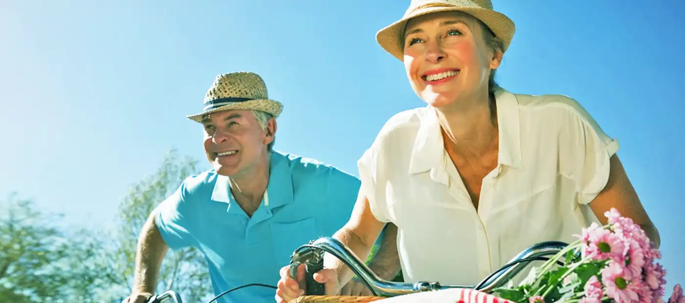 Photo: Elderly couple riding bicycles