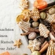 Foto mit Weihnachtsgebäck und Gruß zu Weihnachten und für das neue Jahr