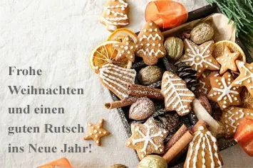 Foto mit Weihnachtsgebäck und Gruß zu Weihnachten und für das neue Jahr